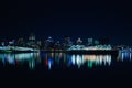 Beautiful Dieppe Park port night skyline with colorful light reflections on the river