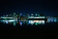 Beautiful Dieppe Park port night skyline with colorful light reflections on the river