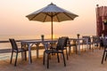 Beautiful dinner table setting on the beach