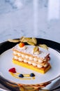 Beautiful dish of Millefeuilles French puff pastry on elegant pl