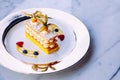 Beautiful dish of Millefeuilles French puff pastry on elegant pl