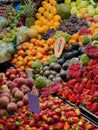 Beautiful display various kind of exotic tropical fresh fruits selling in local farmer market in Porto, Portugal, strawberries, Royalty Free Stock Photo