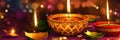 Beautiful diwali lamps with bokeh backgrounds lit during celebration Generative AI