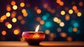 Beautiful diwali oil lamp with bokeh lights on background