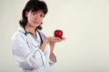 Beautiful doctor with apple Royalty Free Stock Photo