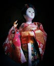 a beautiful doll wearing the traditional clothes of Japan& x27;s sakura country
