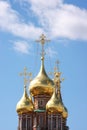 Beautiful domes of temple on a background blue sky Royalty Free Stock Photo