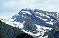 The beautiful and dominant alpine peak of Santis or Saentis in Alpstein mountain range, Unterwasser Royalty Free Stock Photo