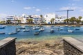 Beautiful downtown of Arrecife with many boats floating on blue water, Lanzarote, Canary Islands, Spain