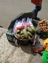 Beautiful Dragon Fruit, Kiwi and Guyabano or soursop fruit selling on wooden basket on roadside