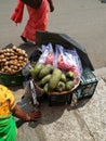 Beautiful Dragon Fruit, Kiwi and Guyabano or soursop fruit selling on wooden basket on roadside