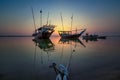 Beautiful dramatic cloud scene background with tied boat at Dammam Sea side at Saudi Arabia Royalty Free Stock Photo