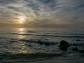 beautiful dramatic golden sky over the sea, reflection at sunset time, long exposure Royalty Free Stock Photo