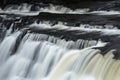 Beautiful dramatic landscape image of Aysgarth Falls in Yorkshire Dales in England during Winter morning Royalty Free Stock Photo