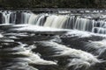 Beautiful dramatic landscape image of Aysgarth Falls in Yorkshire Dales in England during Winter morning Royalty Free Stock Photo