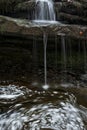 Beautiful dramatic landscape image of Scaleber Force waterfall in Yorkshire Dales in England during Winter morning