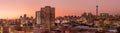 A beautiful and dramatic panoramic photograph of the Johannesburg inner city skyline