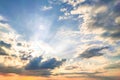 Beautiful dramatic sky opens with rain clouds and soft sunlight reveals blue gradient of atmosphere. Royalty Free Stock Photo
