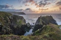 Beautiful dramatic Summer dawn over Lizard Point in Cornwall UK with lovely glowing sky and clouds Royalty Free Stock Photo