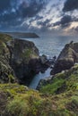 Beautiful dramatic Summer dawn over Lizard Point in Cornwall UK with lovely glowing sky and clouds Royalty Free Stock Photo