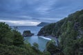 Beautiful dramatic sunrise landsape image of small secluded cove