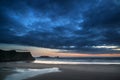 Beautiful dramatic sunset landscape over Rhosilli Bay beach