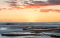 Beautiful dramatic Sunset over a rocky coast Royalty Free Stock Photo