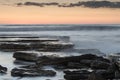 Beautiful dramatic Sunset over a rocky coast Royalty Free Stock Photo