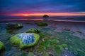 Beautiful drammatic sunset with rocks and beautiful sky. Royalty Free Stock Photo