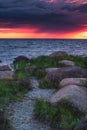 Beautiful drammatic sunset with rocks and beautiful sky. Royalty Free Stock Photo