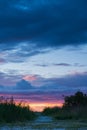 Beautiful drammatic sunset with rocks and beautiful sky. Royalty Free Stock Photo