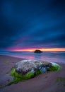 Beautiful drammatic sunset with rocks and beautiful sky. Royalty Free Stock Photo