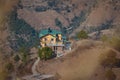 Beautiful Dream house on the top of mountain along with white car and road to the house in Shimla, Himachal Pradesh, India. Royalty Free Stock Photo