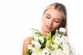Dreamy blonde woman with flowers isolated on white