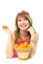 Beautiful dreamy girl with tangerines