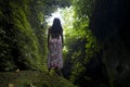 Beautiful dreamy portrait of young attractive and elegant woman in Summer dress enjoying nature relaxed at dreamy and unique green Royalty Free Stock Photo