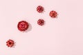 Beautiful dried red flowers, small blossoms on soft pink. Natural flowery pattern, romance holiday concept