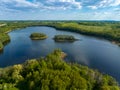 Beautiful drone nature landscape of fields, meadows, forest and lake - sunny day in Poland, Mazury