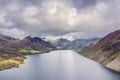 Beautiful drone view over Lake District landscape in late Summer, in Wast Water valley with mountain views and dramatic sky