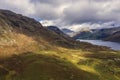 Beautiful drone view over Lake District landscape in late Summer, in Wast Water valley with mountain views and dramatic sky Royalty Free Stock Photo