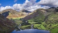 Beautiful drone view over Lake District landscape in late Summer, in Wast Water valley with mountain views and dramatic sky Royalty Free Stock Photo