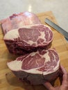 Beautiful dry aged usda prime ribeye steak ready to grille