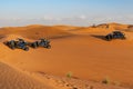 Beautiful Dune buggies racing Dubai desert during sunset in Dubai UAE