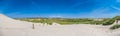 Beautiful dune landscape with traditional lighthouse at North Sea, Germany Royalty Free Stock Photo