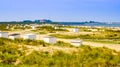 The beautiful dunes with beach cottages and touristy beach, Breskens, Zeeland, The Netherlands Royalty Free Stock Photo