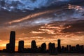 Dramatic Sunset Skies over the Silhouettes of Jersey City Skyline - New York, USA Royalty Free Stock Photo