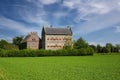 Beautiful dutch countryside landscape, green agriculture field, medieval Hasselholt castle - Ohe en Laak, Netherlands