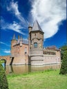 Beautiful dutch fairy tale water castle in green idyllic scenic landscape - Kasteel Heeswijk, Netherlands, Noord-Brabant Royalty Free Stock Photo