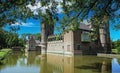 Beautiful dutch water moat castle with towers - Kasteel Heeswijk, Netherlands Royalty Free Stock Photo