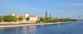 Beautiful early morning cityscape of the old town of Riga, St Peter`s Church Tower and Daugava river, Latvia. Royalty Free Stock Photo